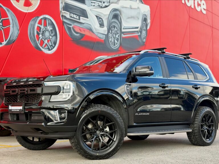 Black Ford Everest Platinum with black multi-spoke alloy wheels outside Tyreforce.